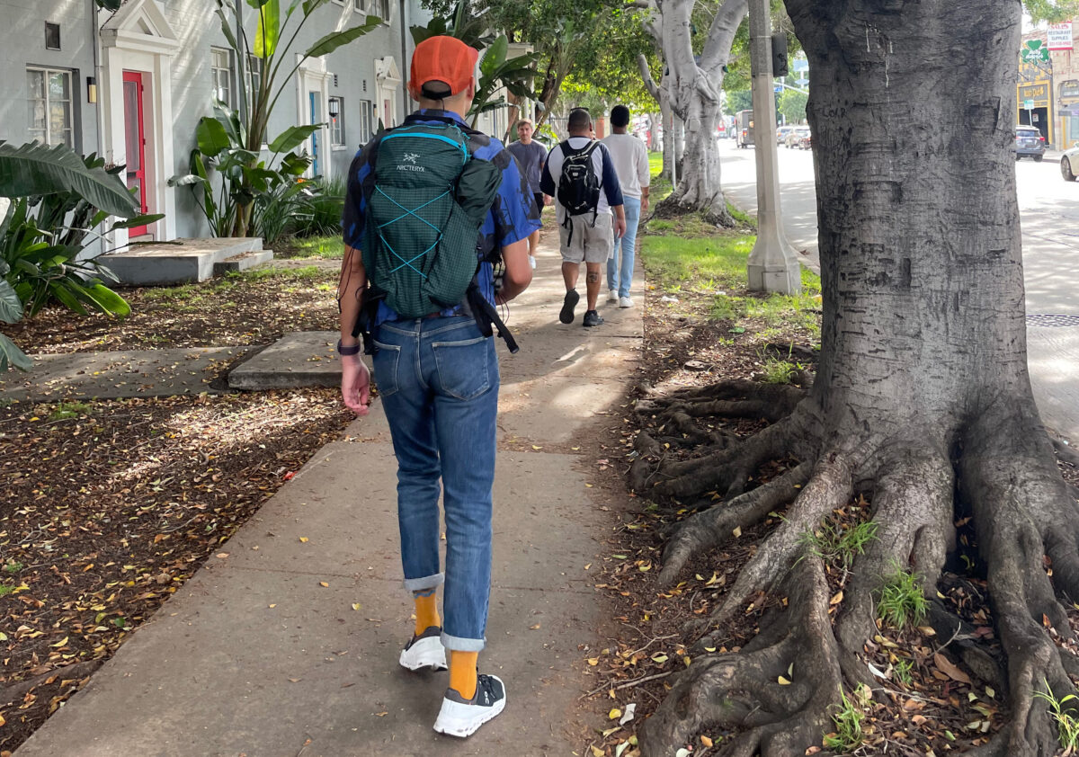 man walking on a sidewalk